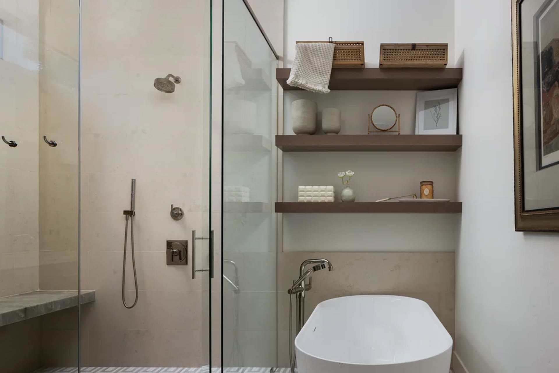 A stone shower, a free-standing tub, and walnut shelves. Tuckey, Scottsdale, Desert Dwelling.