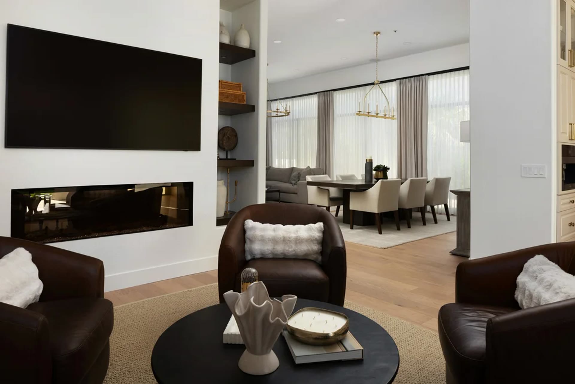 The lounge opening through to dining and living — one room, then another. Tuckey, Scottsdale, Desert Dwelling.